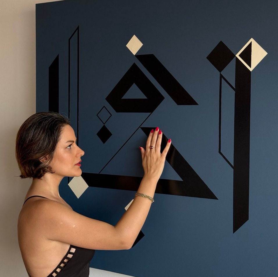 Dora Motèque touches Calligraph of Absence an Augmented Painting of the Sounding Canvas series
